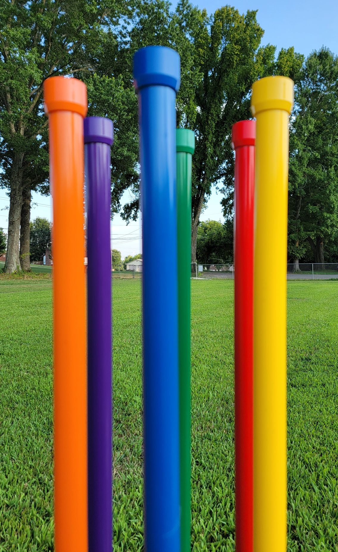 Solid color PVC poles with matching caps